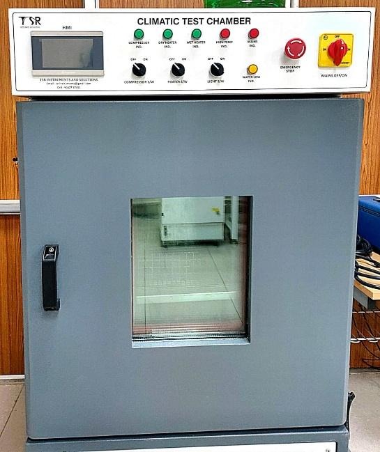 A grey box with buttons and a glass window

AI-generated content may be incorrect.