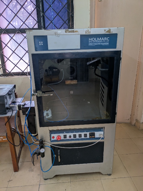 A machine with a glass door
AI-generated content may be incorrect.