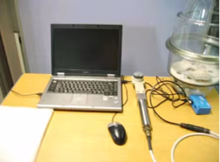 Microwave NDT system for moisture estimation of green ceramics